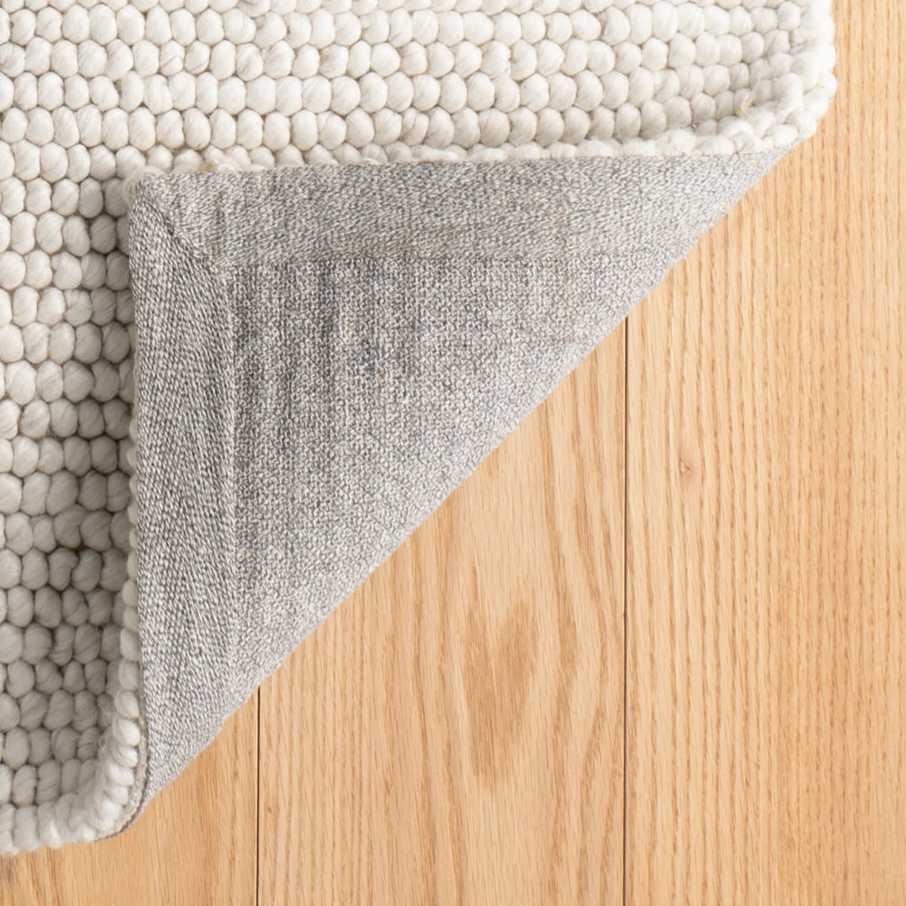 Niels Handwoven Woolviscose Rug | Ivory